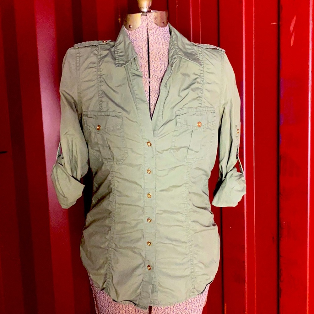 A 3/4 sleeve camo green button down blouse